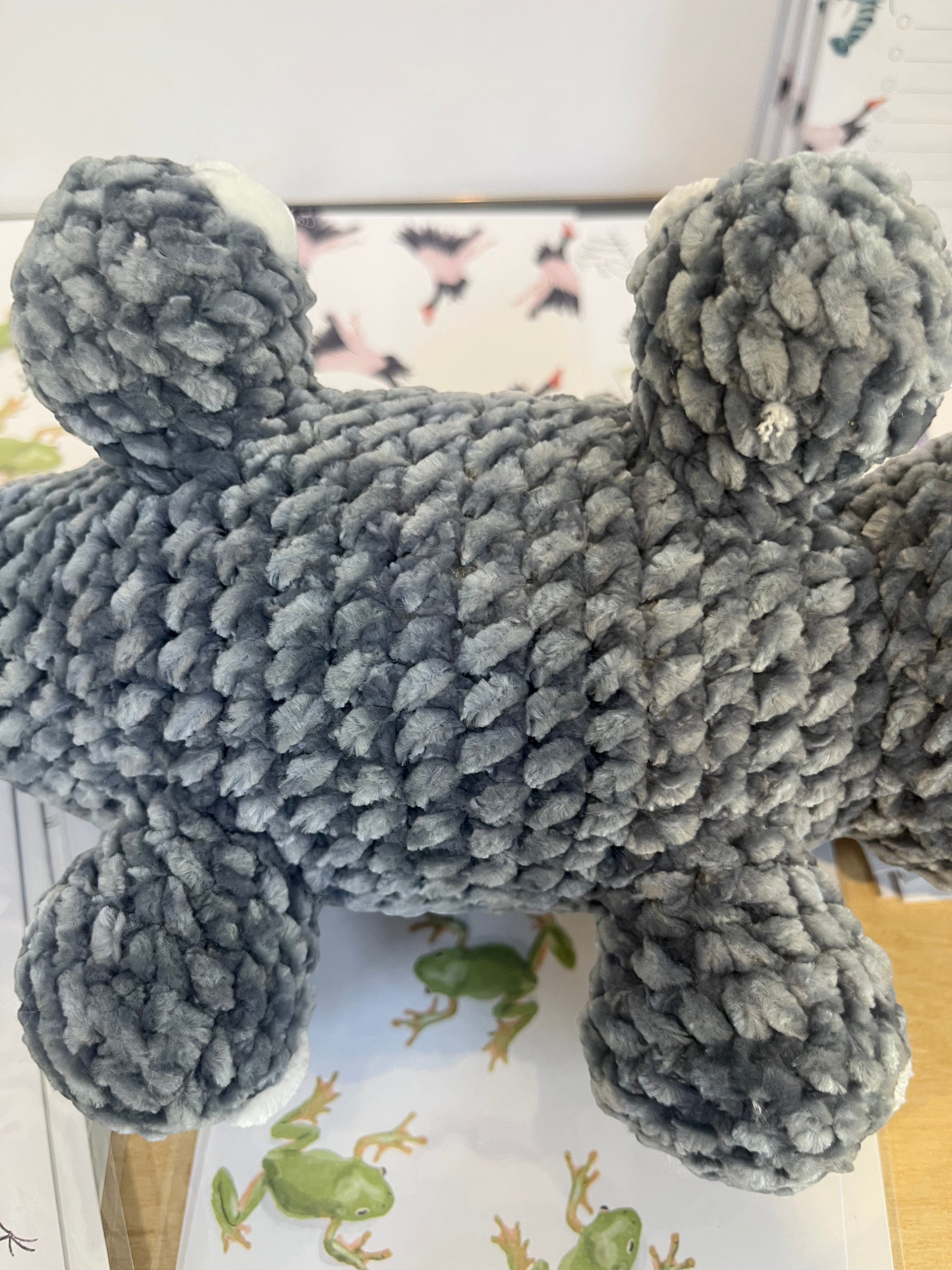 Suzie's Sunshine Dolls Kurtis the Croc, a handmade grey plush crocodile toy with white toes and stitched smile.