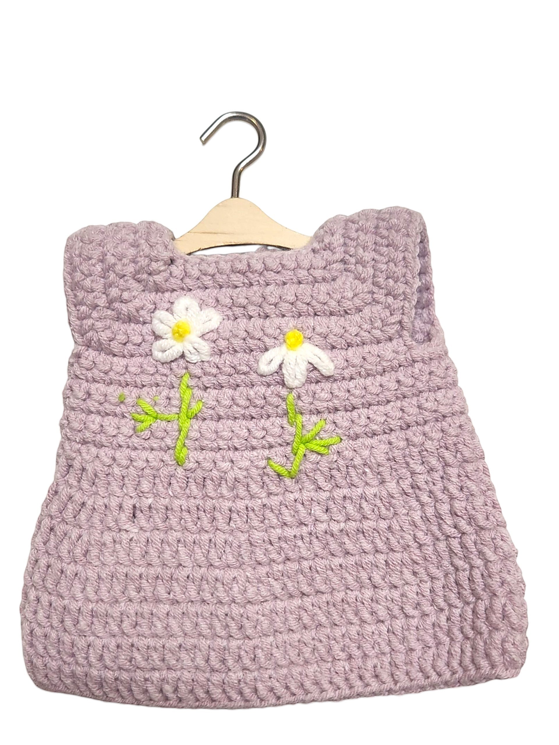Suzie's Sunshine Dolls handmade lavender crochet doll dress with white daisy appliques and green stems.
