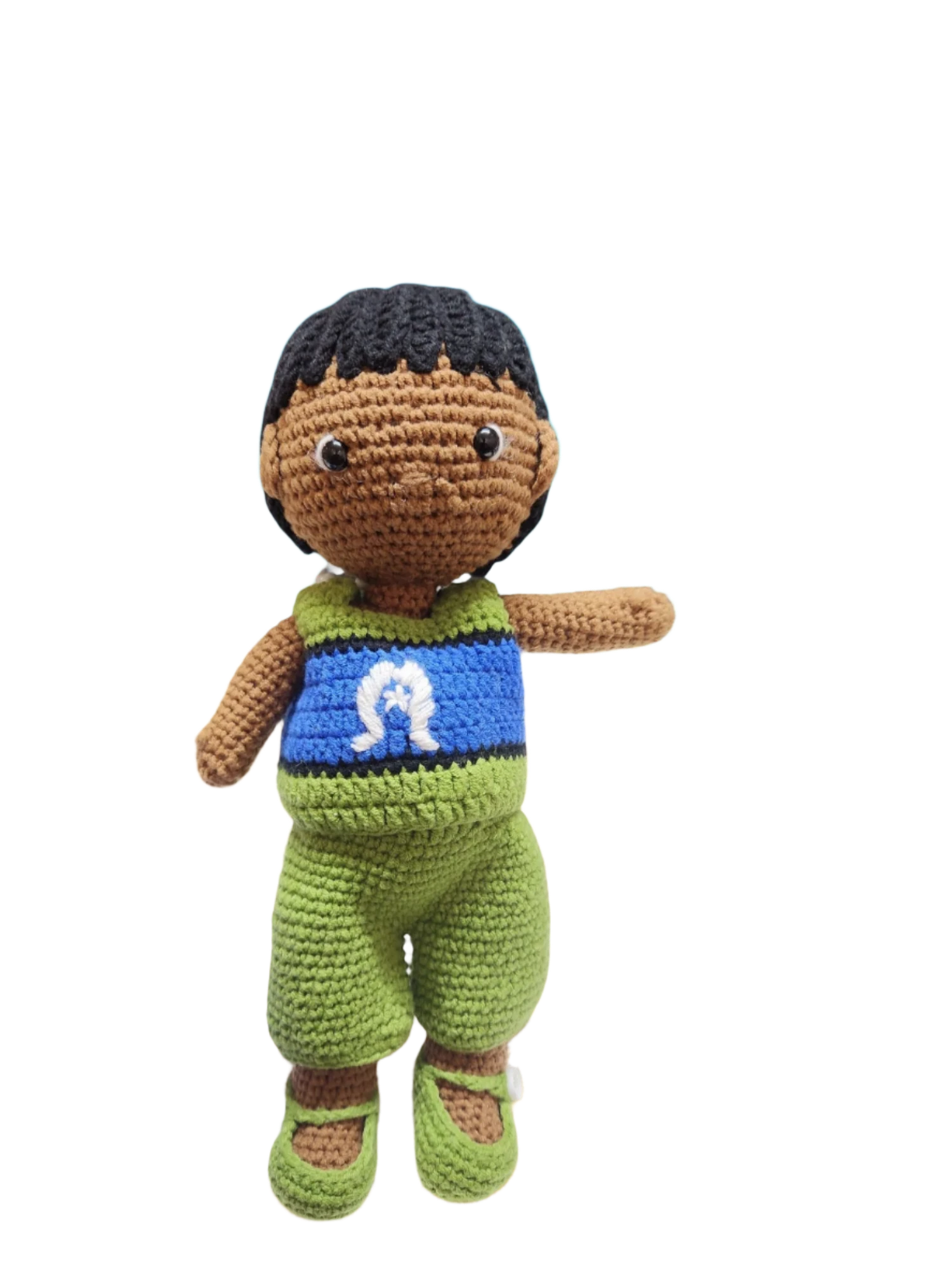 Suzie's Sunshine Dolls Malakai, a crocheted Torres Strait Islander doll with short black hair and a green outfit inspired by the flag.