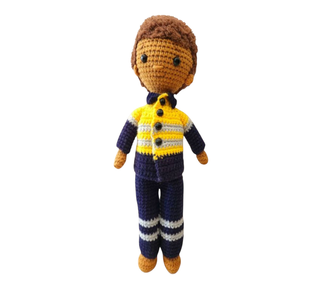 Suzie's Sunshine Dolls Miner/Tradie doll in yellow hi-vis, navy pants, and grey stripes. Handmade crocheted toy.