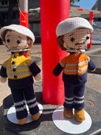 Suzie's Sunshine Dolls Miner/Tradie doll in yellow hi-vis jacket and navy pants, crocheted by hand.