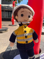 Suzie's Sunshine Dolls Miner/Tradie doll in yellow hi-vis jacket and navy pants, crocheted by hand.