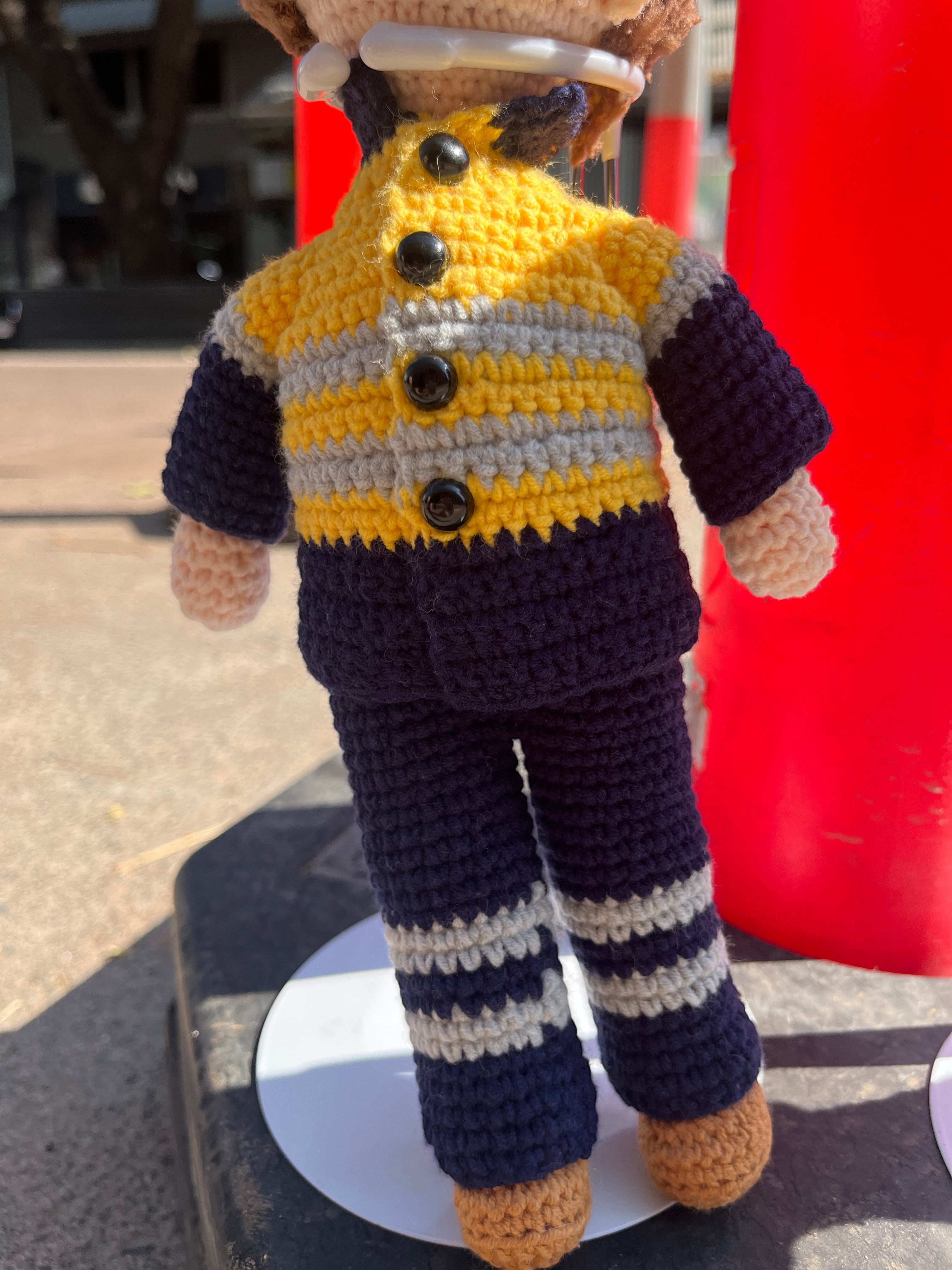 Suzie's Sunshine Dolls Miner/Tradie doll in yellow hi-vis jacket with navy pants and grey stripes. Handmade.