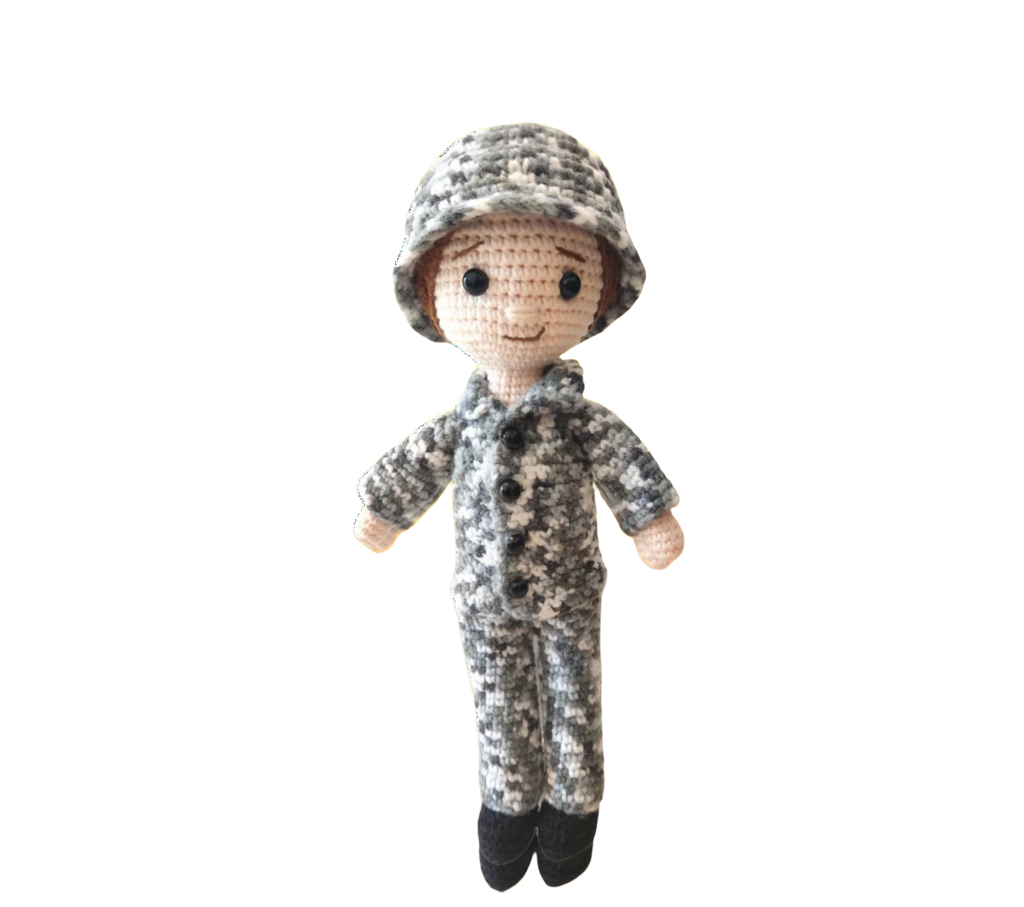 Suzie's Sunshine Dolls Navy doll in camouflage uniform and cap, crocheted from yarn. Approx. 28-30cm tall.