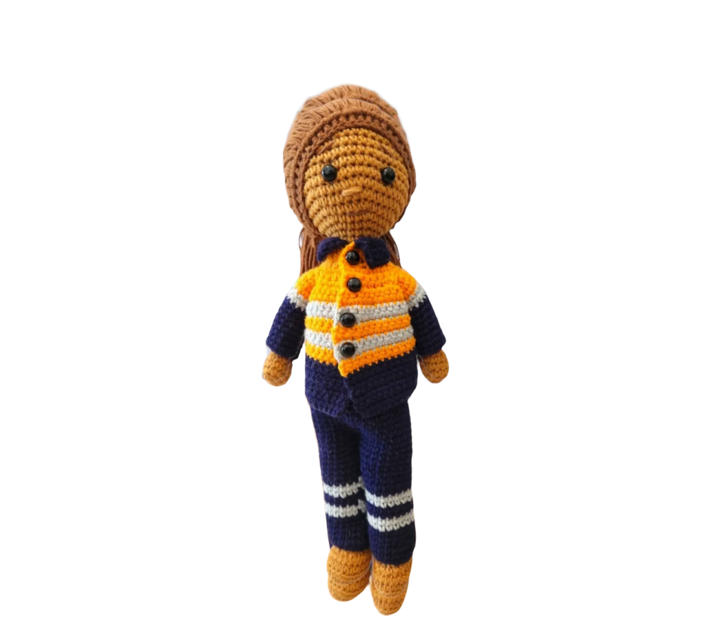 Suzie's Sunshine Dolls orange hi-vis miner/tradie doll, crocheted with navy pants and striped sleeves.