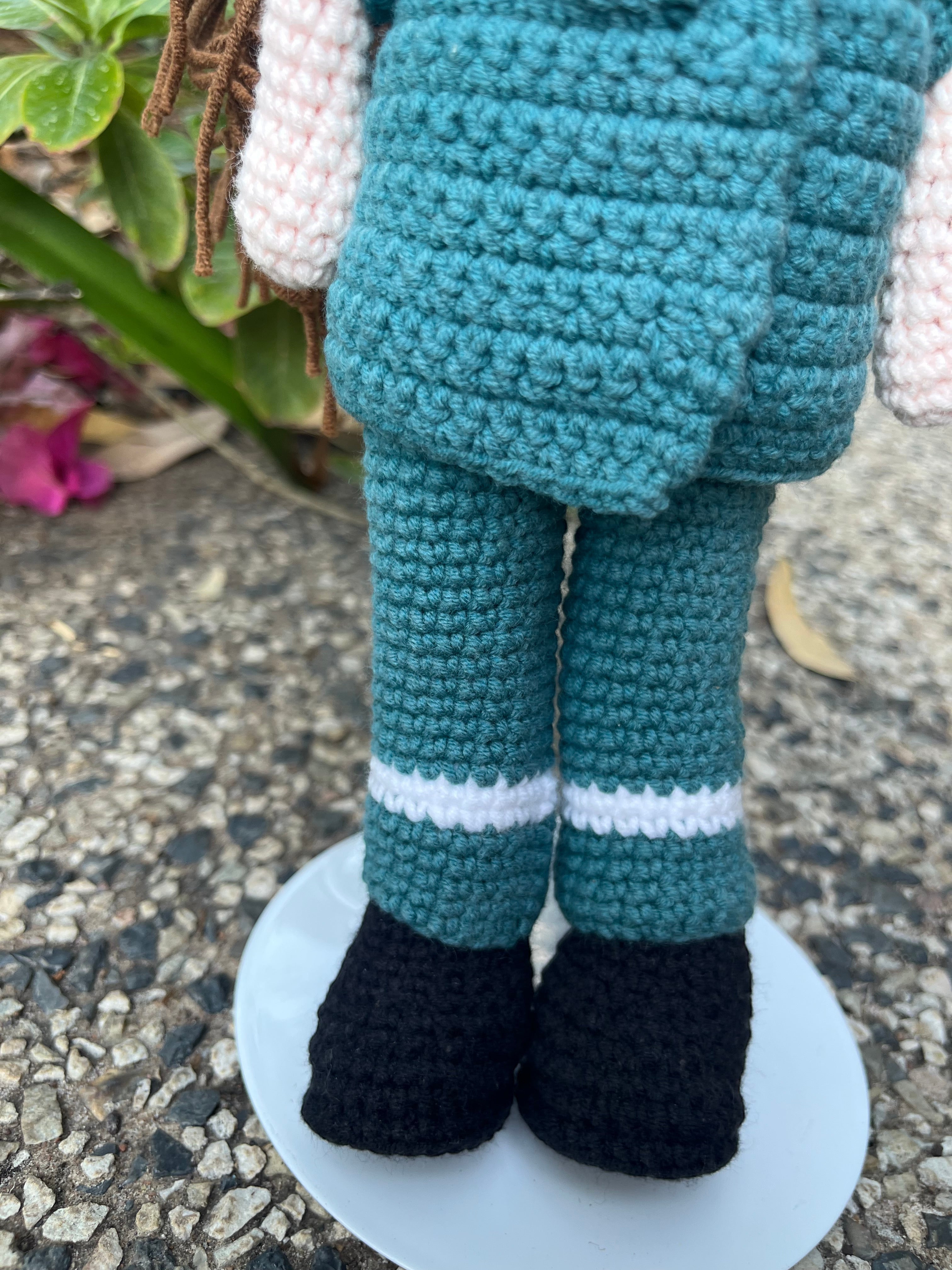 Suzie's Sunshine Dolls Paramedic doll in green uniform with white stripes and black boots, handmade crochet.