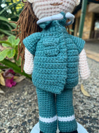 Suzie's Sunshine Dolls Paramedic doll in green uniform with white stripes on legs, crochet material, with toy stethoscope.