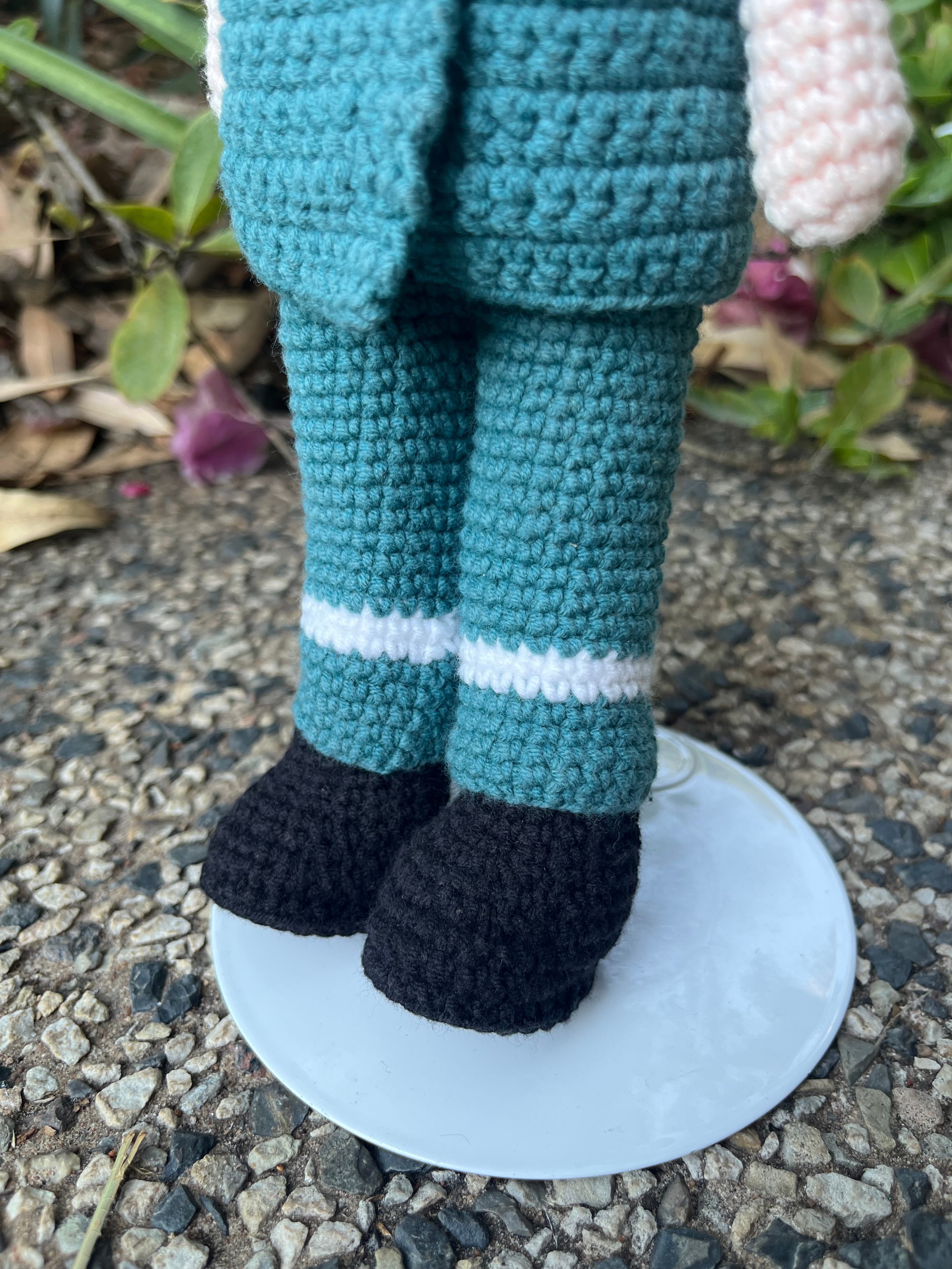 Suzie's Sunshine Dolls Paramedic doll in green uniform with white stripes and black boots, handmade crochet.