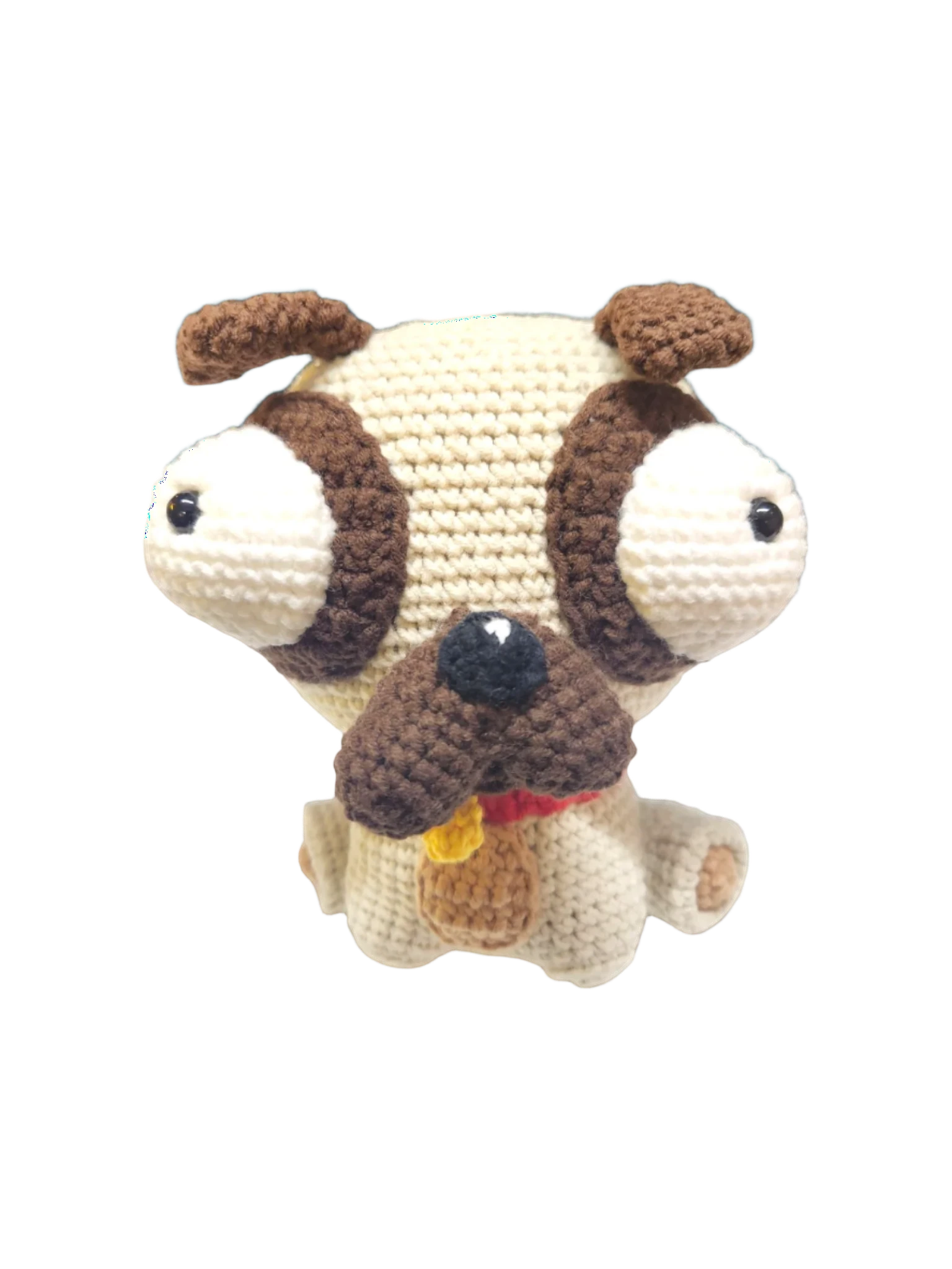 Suzie's Sunshine Dolls Pig the Pug crochet toy with big eyes, brown ears, and tongue out.
