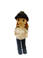 Suzie's Sunshine Dolls handmade crocheted pilot doll in uniform with hat, white shirt, and black pants.