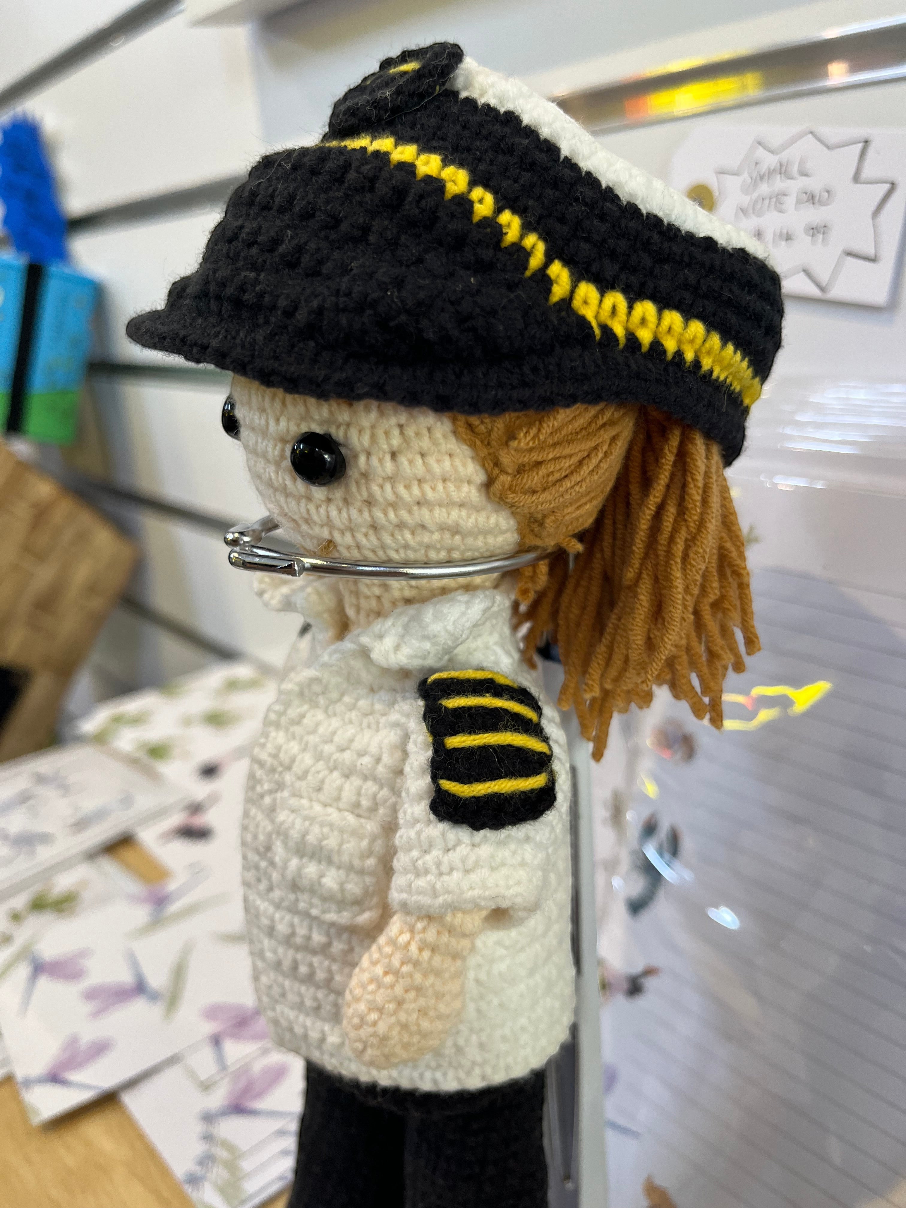 Suzie's Sunshine Dolls handmade crocheted pilot doll in uniform with stripes and hat, approx. 28-30cm tall.