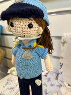 Suzie's Sunshine Dolls Policeman/Policewoman crochet doll in blue uniform with navy cap and pants. Approx 28-30cm.