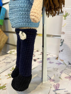 Suzie's Sunshine Dolls crocheted policeman doll in blue uniform with navy pants and black boots. Handmade.