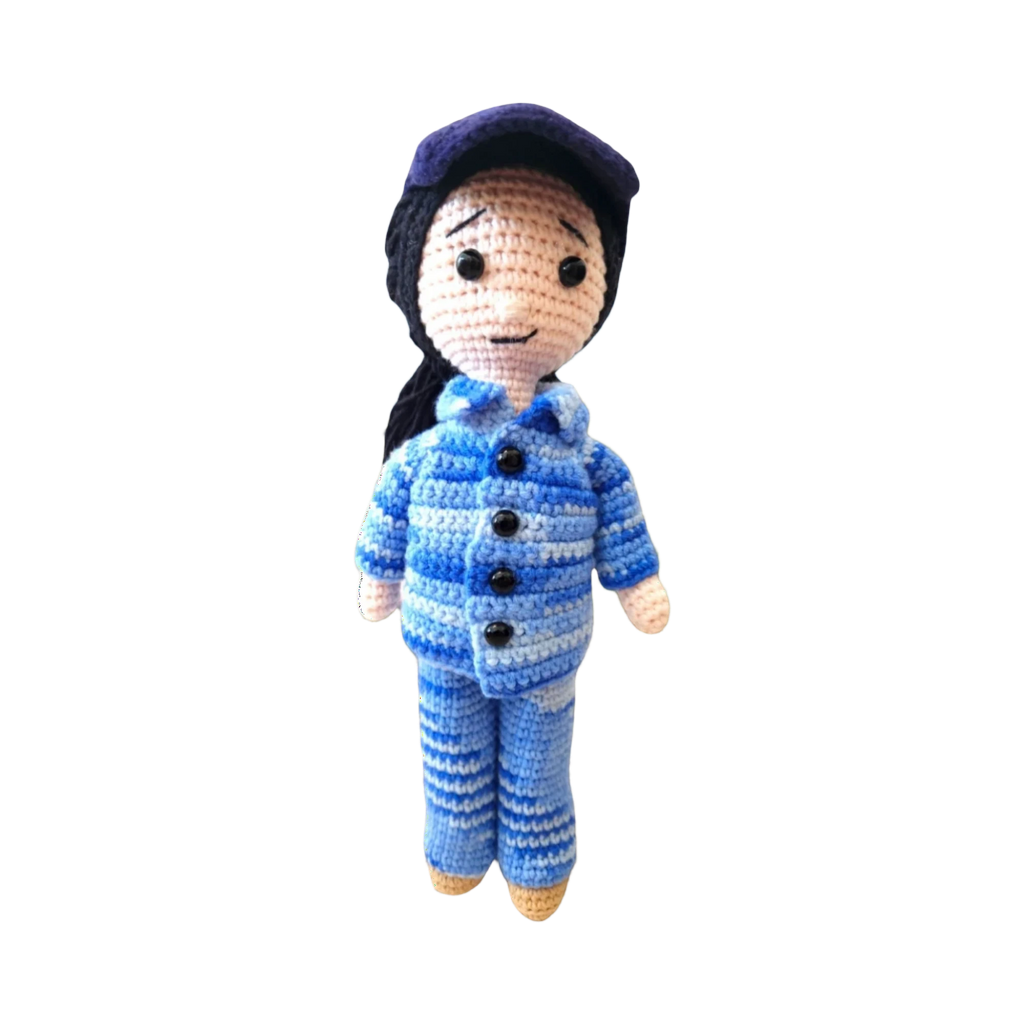 Suzie's Sunshine Dolls RAAF Personnel doll in blue camouflage uniform with matching cap, handmade from soft yarn.