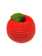 Suzie's Sunshine Dolls red crocheted apple with green leaf and brown stem, made from cotton yarn.