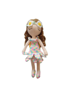 Suzie's Sunshine Dolls River crochet doll with brown curls, daisy crown, and pastel rainbow dress. Yellow wings.