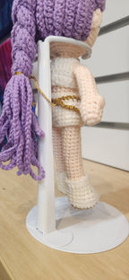Suzie's Sunshine Dolls Rumi K-Pop Demon Hunter amigurumi doll with lilac hair and white outfit with gold trim.