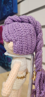 Suzie's Sunshine Dolls Rumi K-Pop Demon Hunter amigurumi doll with lilac hair and white outfit with gold trim.