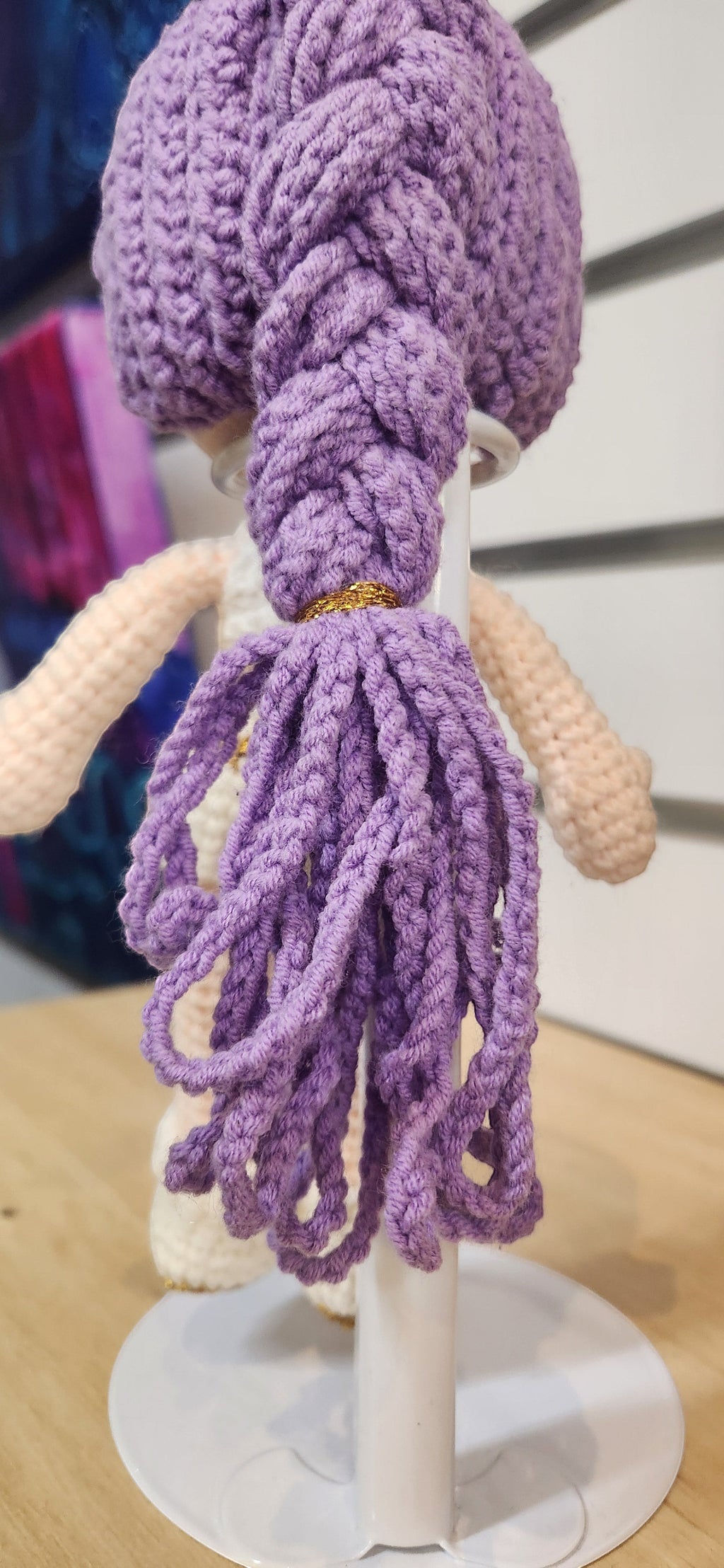 Suzie's Sunshine Dolls Rumi K-Pop Demon Hunter amigurumi doll with purple braided hair and gold accent.