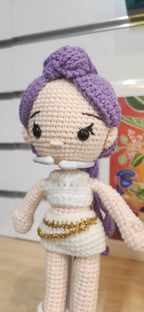 Suzie's Sunshine Dolls Rumi K-Pop Demon Hunter amigurumi doll with lilac hair and white outfit with gold trim.