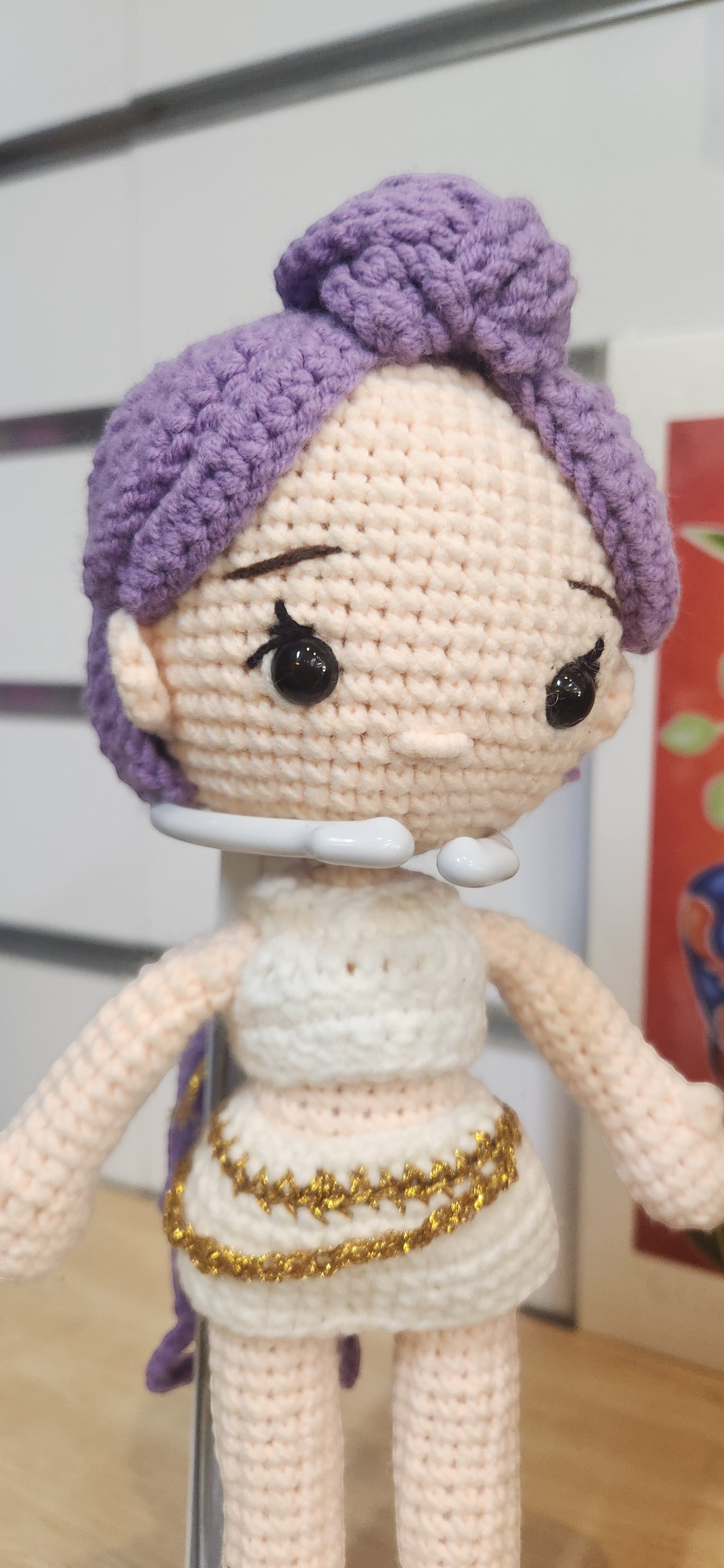Suzie's Sunshine Dolls Rumi K-Pop Demon Hunter amigurumi doll with lilac hair, white outfit, and gold belt.