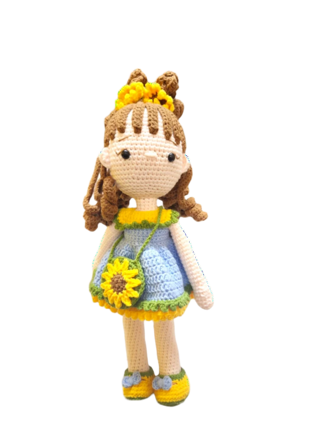 Suzie's Sunshine Dolls Sophie, a crocheted doll in a blue dress with yellow and green trim, sunflower purse, and flower crown.