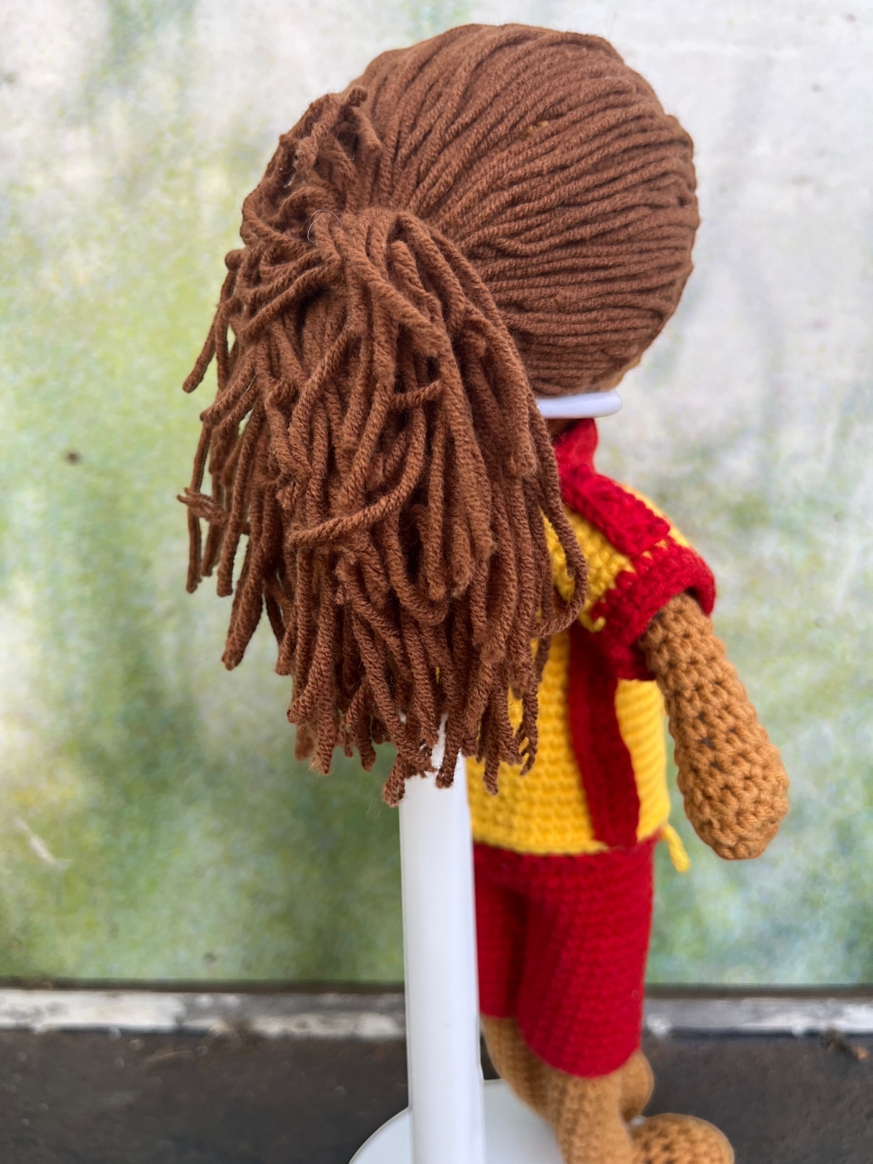 Suzie's Sunshine Dolls Surf Lifesaver doll, handmade crochet, red and yellow uniform, brown yarn hair.