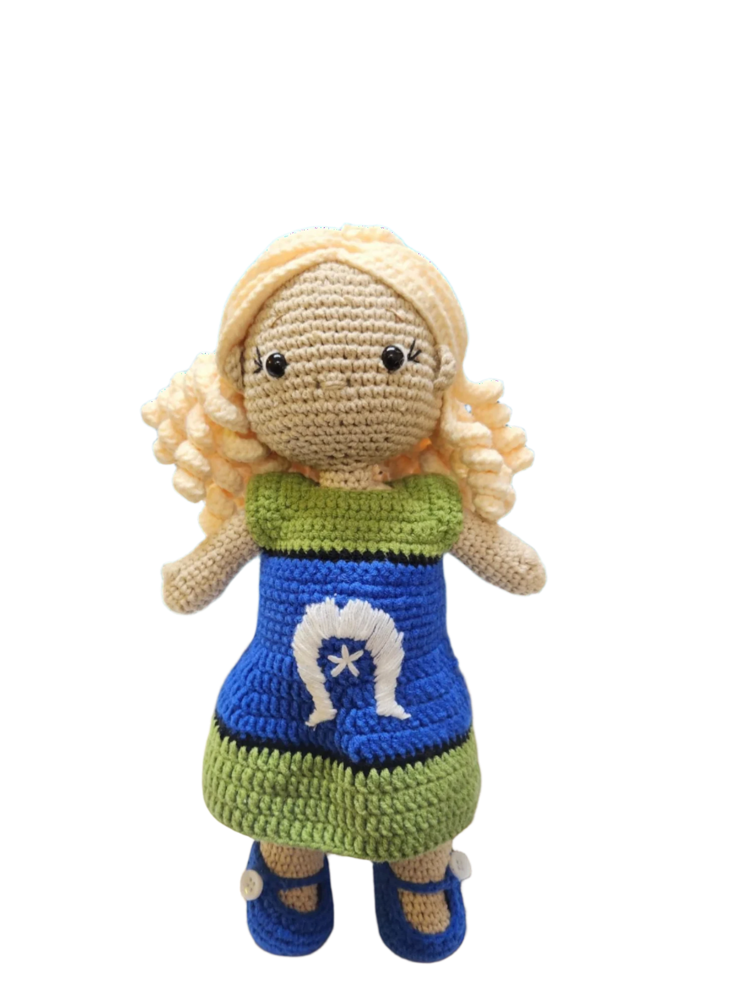 Suzie's Sunshine Dolls Leilani, a handmade crochet doll with blonde curly hair and a blue dress featuring the Torres Strait Islander flag symbol.