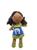 Suzie's Sunshine Dolls handmade crochet doll with long black curly hair and a dress inspired by the Torres Strait Islander flag.