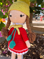 Suzie's Sunshine Dolls Zoey doll in red crocheted dress, yellow beanie, and turquoise scarf. Handmade.