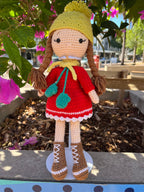 Suzie's Sunshine Dolls Zoey doll in red crocheted dress, yellow beanie, and brown boots. Handmade.