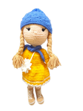 Suzie's Sunshine Dolls Zoey doll in yellow dress, blue hat, blue scarf, and brown boots. Hand-crocheted.