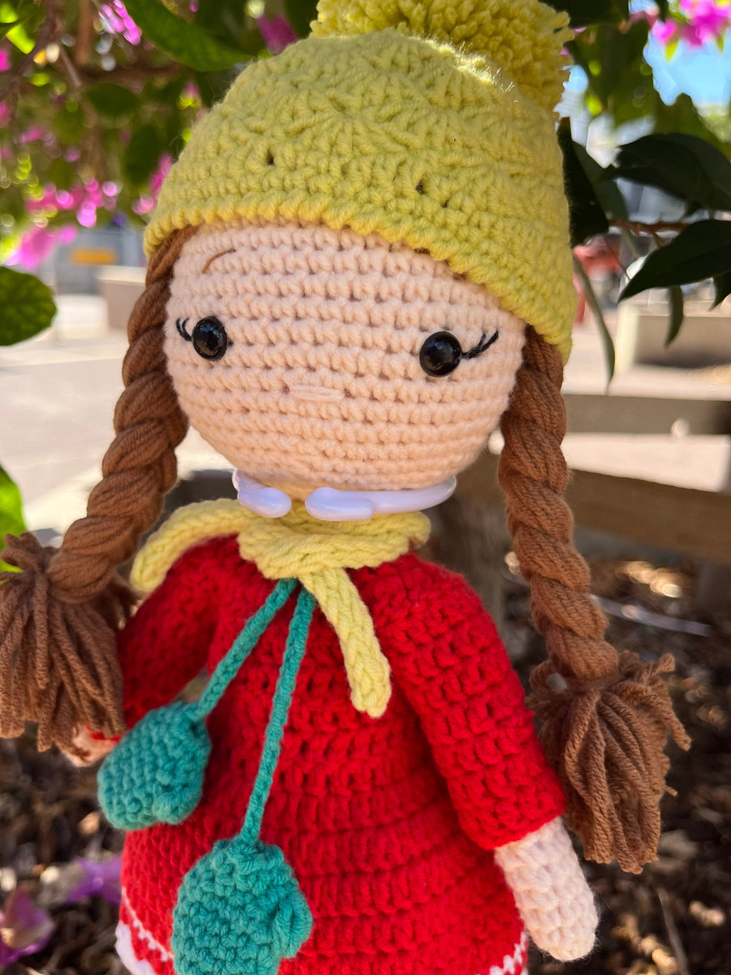 Suzie's Sunshine Dolls Zoey doll with red crocheted dress, yellow beanie, and turquoise scarf. Handmade.